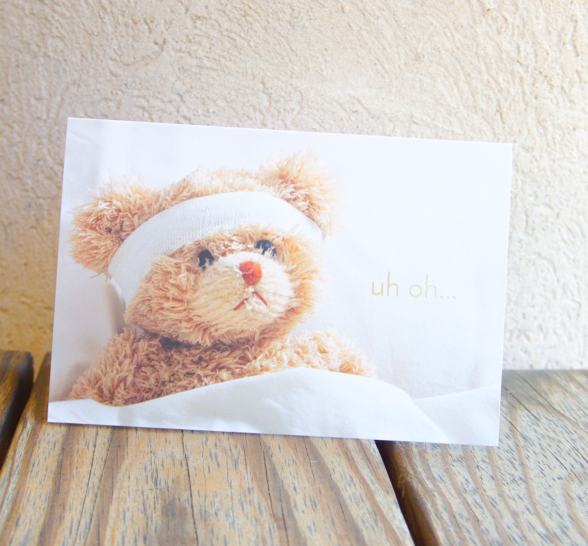 Get well soon card teddy bear with bandaged arm Vector Image